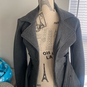 Shebby woman’s gray wool coat